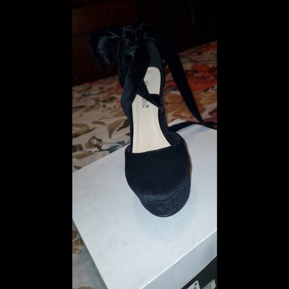 Black strapped heels